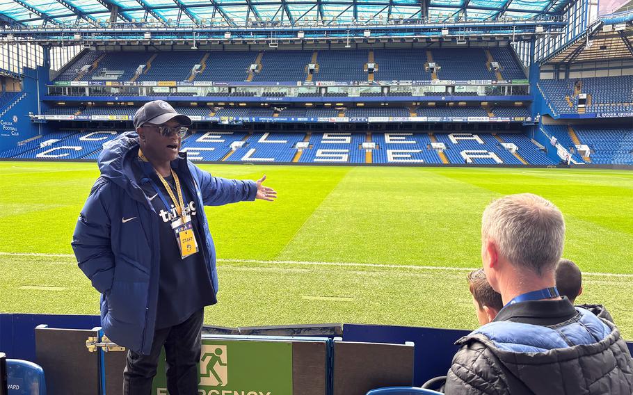 An employee of Chelsea Football Club entertains and pokes fun at local rival Tottenham Hotspur during a tour of Stamford Bridge, London, on March 16, 2024.