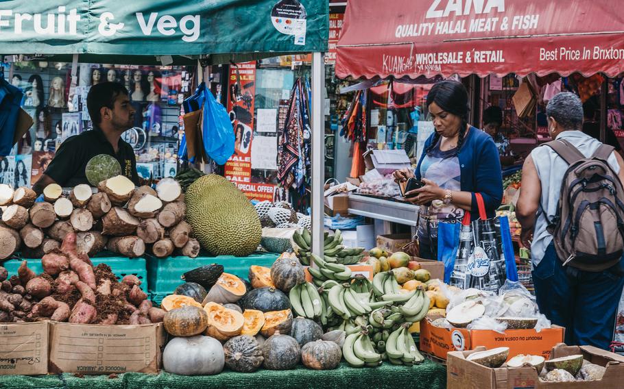 Brixton Market is a multiethnic community market in London that's run by local traders, many of whom have ties to Jamaica and the Caribbean culture.