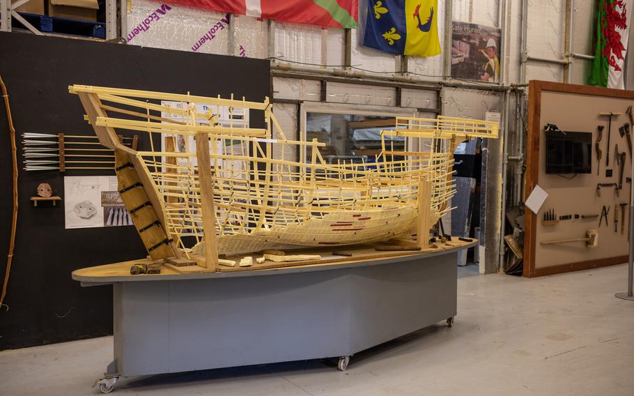 A scale model, kept in a warehouse in Newport, Wales, shows the salvaged lower part of the ship and what the rest of the vessel might have looked like. 