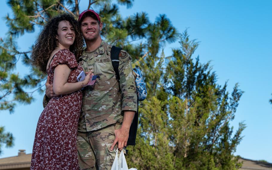 A U.S. Air Force airman assigned to the 823rd Rapid Engineer Deployable Heavy Operational Repair Squadron Engineer poses for a photo with his family at Hurlburt Field, Fla., Sunday, April 14, 2024. 