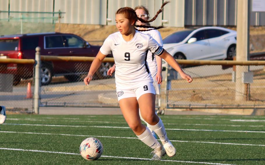 Clarice Lee looks up the field.