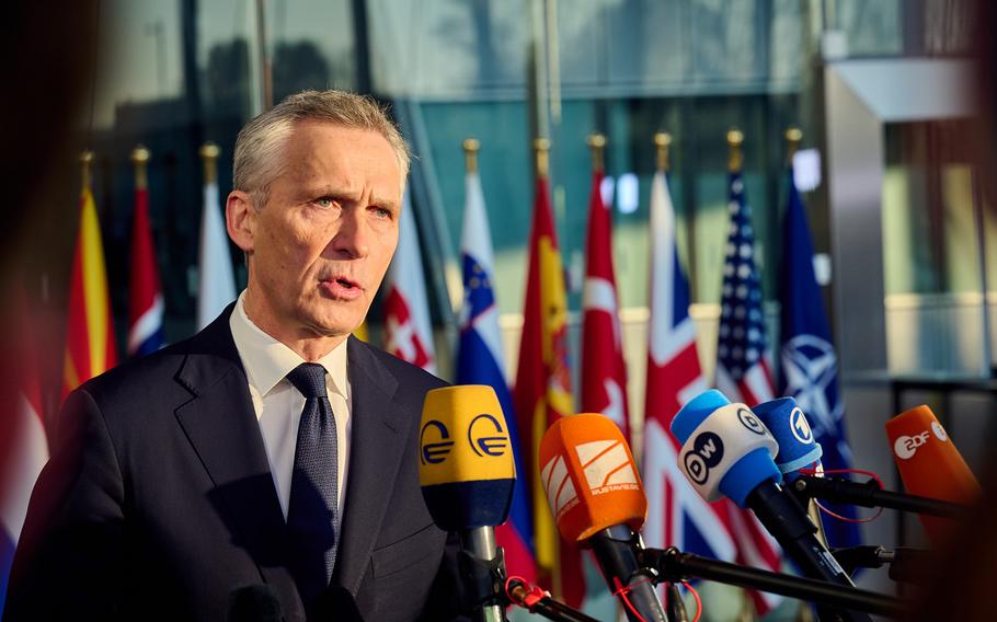 NATO Secretary-General Jens Stoltenberg talks to reporters before the first day of the NATO defense ministers meeting in Brussels, Tuesday, Feb. 14, 2023.