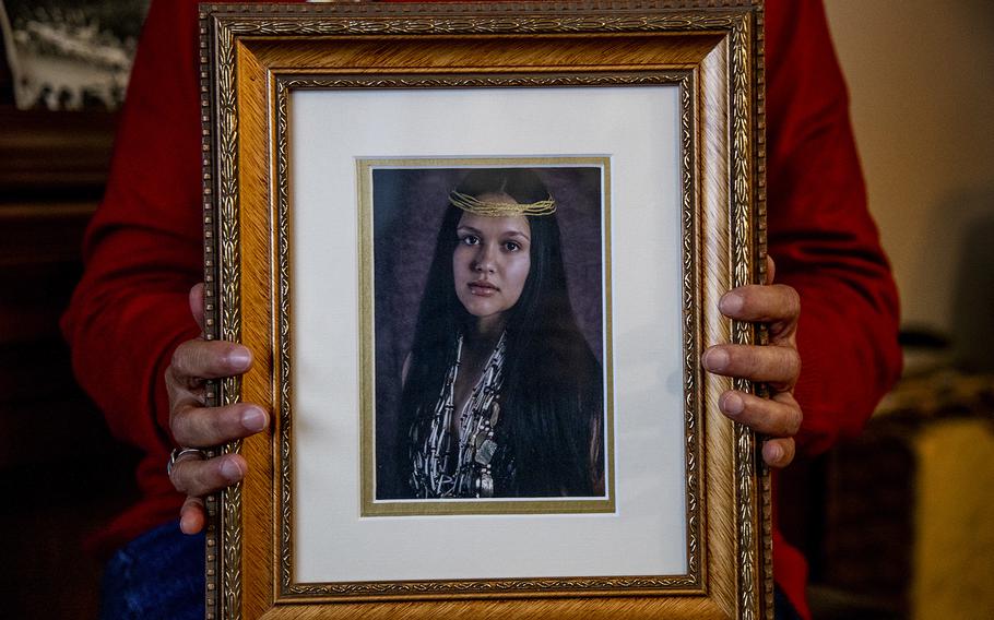 Judy Risling holds a photograph of her daughter Emmilee Risling on Oct. 5, 2022, in Pecwan, California. Emmilee Risling was last seen walking on a bridge in a rural area of the Yurok Reservation before she disappeared in October of 2021 on the rural Native American reservation in Humboldt County. 