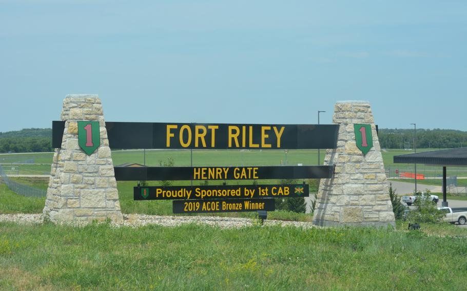 A gate with text that reads “FORT RILEY” and “Henry Gate.”