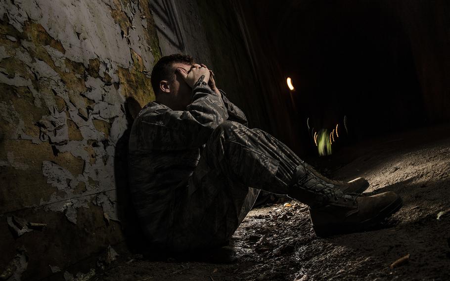 An Air Force photo illustration depicts a person who may benefit from a variety of military community resources to assist individuals in need of mental health programs geared toward suicide prevention and increasing resiliency. 