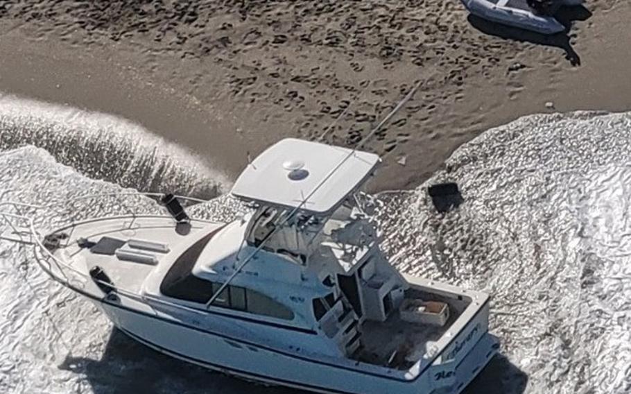 An abandoned vessel on Juno Beach, Fla., Dec. 12, 2021. U.S. Border Patrol officers apprehended 26 people following a maritime smuggling event.