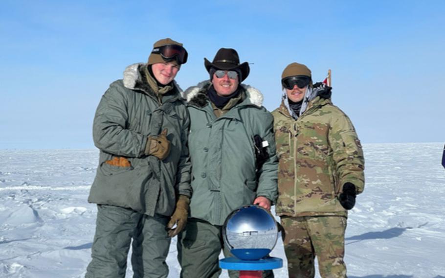 The National Guard maintenance recovery team, from left, Staff Sgt. Grant Santese, Tech. Sgt. Daniel Craig and Staff Sgt. Jonathan Hooker who worked for two days in November in extreme weather to repair a LC-130 Skibird cargo plane at Amundsen-Scott South Pole Station on Antarctica.
