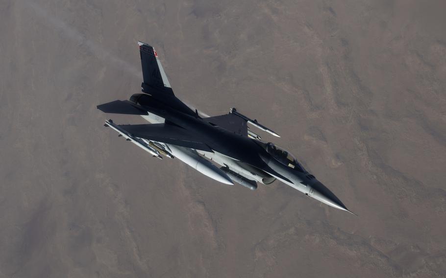 A U.S. Air Force F-16 Fighting Falcon flies over Syria in 2017.  A top-secret U.S. military strike cell in Syria launched thousands of bombs and missiles on Islamic State targets but skirted protocols meant to protect civilians, The New York Times reported Dec. 12, 2021.