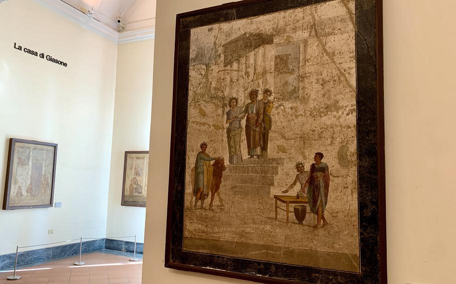 A fresco framed on a wall
