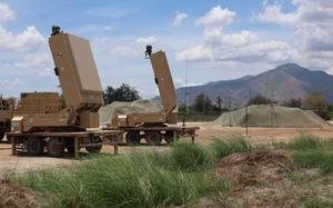 Large military equipment is on display during a training exercise.