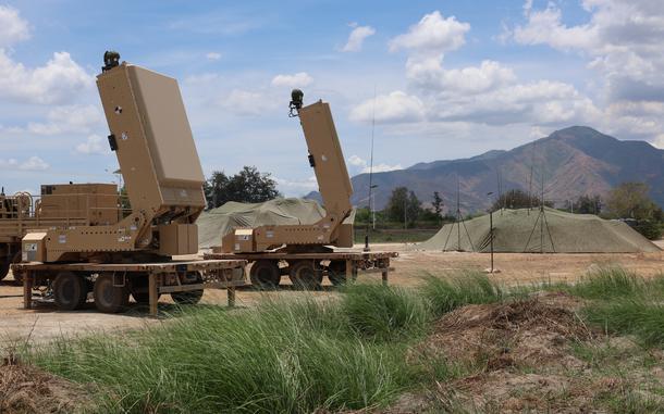Large military equipment is on display during a training exercise.