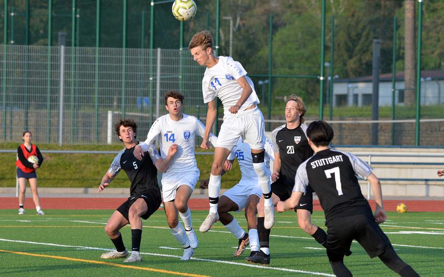 Wiesbaden’s Jacob Goodman goes up for a header in the boys Division I final at the DODEA-Europe soccer championships in Ramstein, Germany, May 18, 2023. Stuttgart beat Wiesbaden 2-1 to win the title. Watching are teammate Colin Koschnik and from left, Stuttgart’s Seth Rosenbloom, Jacob Schudel and John Gilliand,