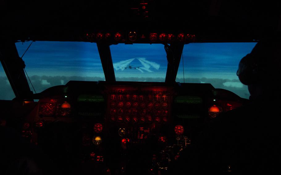 A 69th Bomb Squadron pilot and co-pilot operate a B-52H Stratofortress weapons system trainer during a simulated flight at Minot Air Force Base, N.D., in 2017. A recent Rand Corp. report says the Air Force needs more simulators so crews can rehearse combat scenarios that aren't easily replicated in the air.