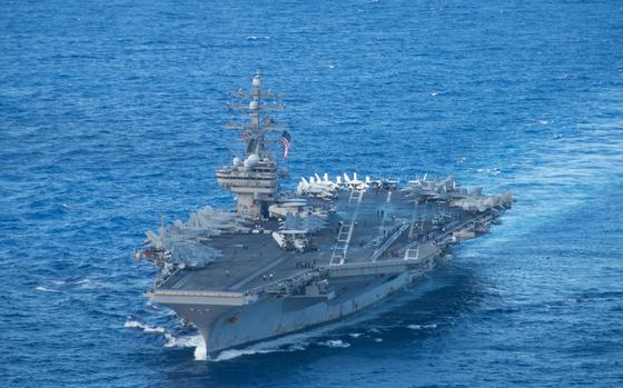 The aircraft carrier USS Ronald Reagan steams through the Philippine Sea, Aug. 16, 2022.