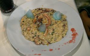 Risotto at Piemont Restaurant in Kirchheimbolanden, Germany, is served with octopus, orange peels, basil and lemon foam. The meal costs 16.90 euros.