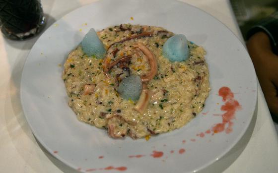 Risotto at Piemont Restaurant in Kirchheimbolanden, Germany, is served with octopus, orange peels, basil and lemon foam. The meal costs 16.90 euros.
