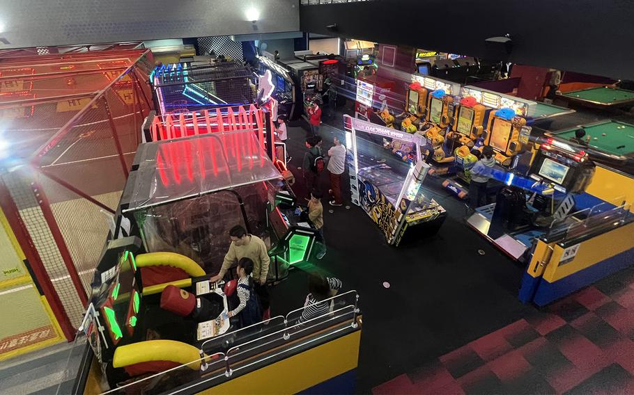 Round1 patrons play games at the location in Musashimurayama, Japan, Jan. 8, 2023. 