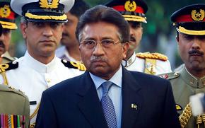 FILE - Outgoing President Pervez Musharraf is surrounded by top military officers as he leaves the Presidential House in Islamabad, Pakistan on Aug. 18, 2008, file photo. Musharraf, Pakistan's former military ruler, is critically ill and has been hospitalized in Dubai since last month, his family said Friday, June 10, 2022.  (AP Photo/Emilio Morenatti, File)