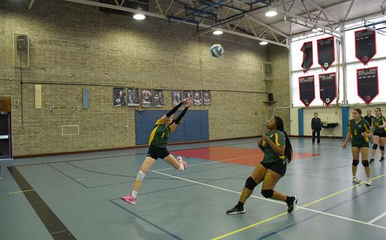 SHAPE's Jessica Moon keeps a point alive for her team Satuday in a match against the host Lakenheath Lancers.