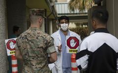 Medical personnel at Marine Corps Base Hawaii take preventative measures due to the coronavirus pandemic, March 23, 2020.