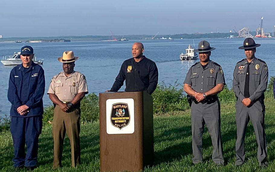 Gov. Wes Moore, center, held a news conference on May 21, 2024, one day after the container ship Dali was refloated.