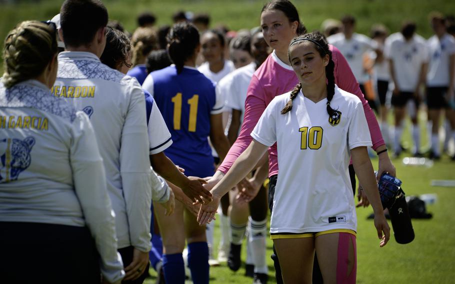 Ansbach’s Abbi Ackles leads the congratulatory handshakes after her team’s 4-0 loss to Sigonella during the 2024 DODEA European Soccer Division III Championships in Landstuhl, Germany, on May 20, 2024.