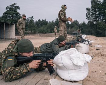 Recruits practice shooting at an Azov brigade training camp outside Kyiv, Ukraine, on March 24. 