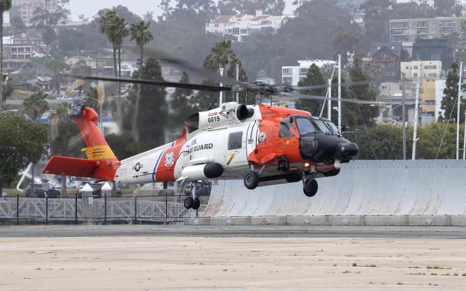 A Coast Guard Air Station San Diego air crew takes off in an MH-60 Jayhawk helicopter at Coast Guard Sector San Diego, April 12, 2023. 