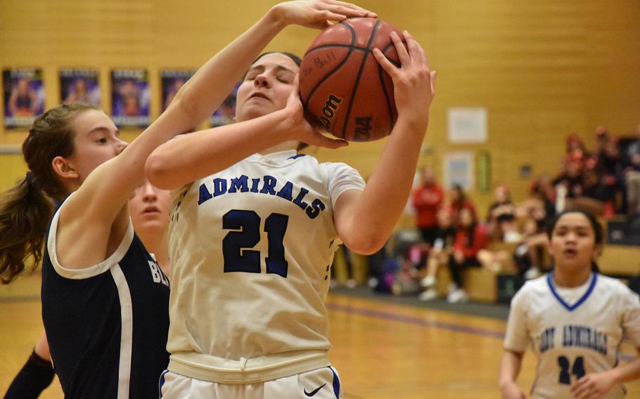 Black Forest Academy’s Danielle Cherry blocks a shot from Rota’s Allie DeMerritt at the DODEA European Division II Basketball Championships at Wiesbaden, Germany, on Wednesday, Feb. 14, 2024.