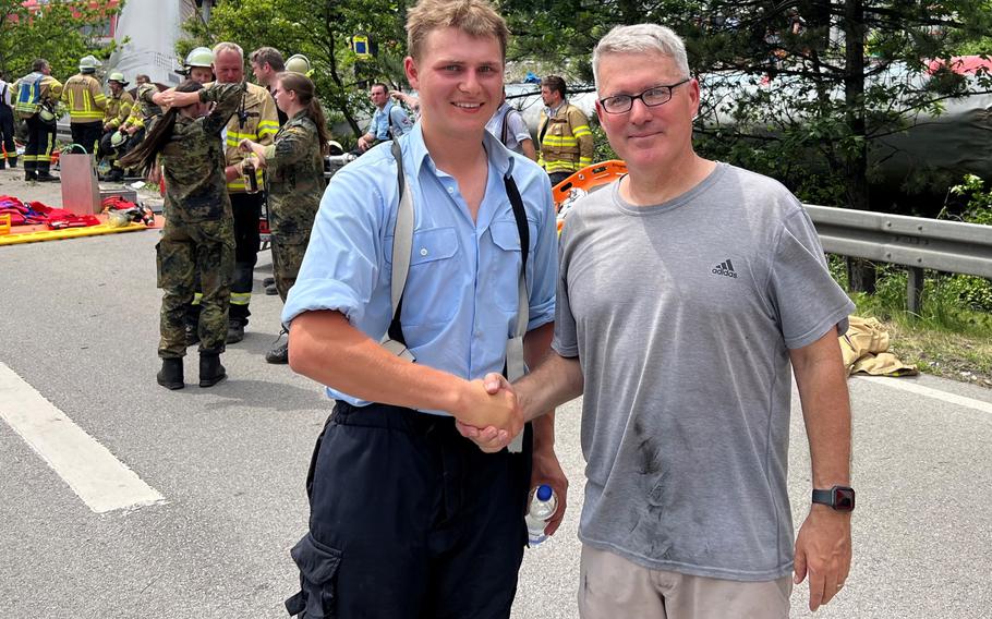 Army Col. Charles Bergman, right, and Martin Maurer of the Partenkirchen fire department were among the rescuers June 3, 2022, when a train derailed near Garmisch-Partenkirchen, Germany, killing five people and injuring more than 40.