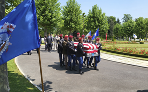 Military casket bearers carry the remains of an unknown American soldier from World War I to his final grave site at Oise-Aisne American Cemetery in Seringes-et-Nesles, France, on Wednesday, June 7, 2023.