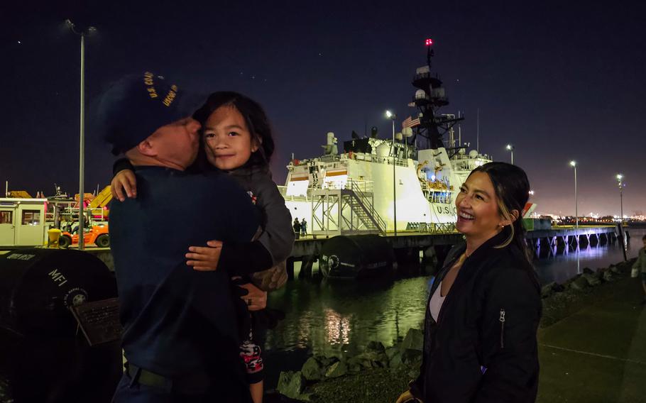A U.S. Coast Guard Cutter Stratton (WMSL 752) crew member gets a warm welcome home after returning to Alameda, Calif., Sunday, April 21, 2024. 