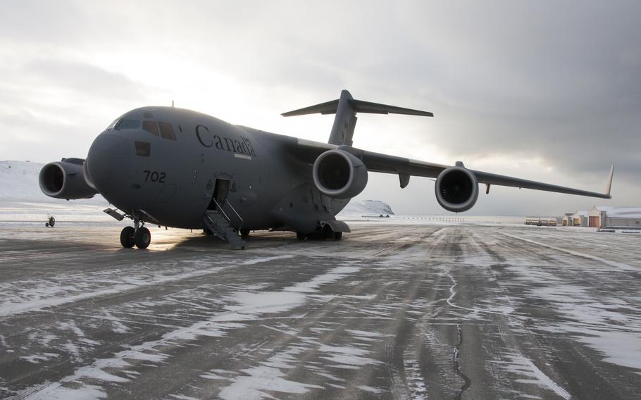 A Canadian C-17 sits on the runway at Thule. The Canadian Air Force used the runway at Thule for two weeks for its Operation Boxtop II in September and October 2014, resupplying Arctic bases including Canadian Forces Station Alert, the northernmost permanently inhabited place in the world.