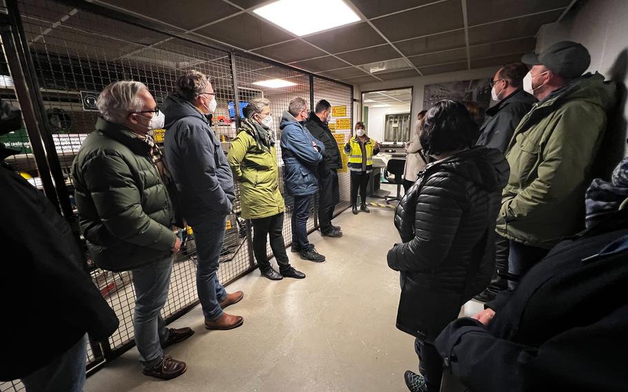 Visitors crowd into the maintenance area of the former German government bunker in Bad Neuenahr-Ahrweiler, Germany, Feb. 13, 2022. The facility featured a full hardware and tool department that offered replacement parts allowing for repairs for every item in the facility.