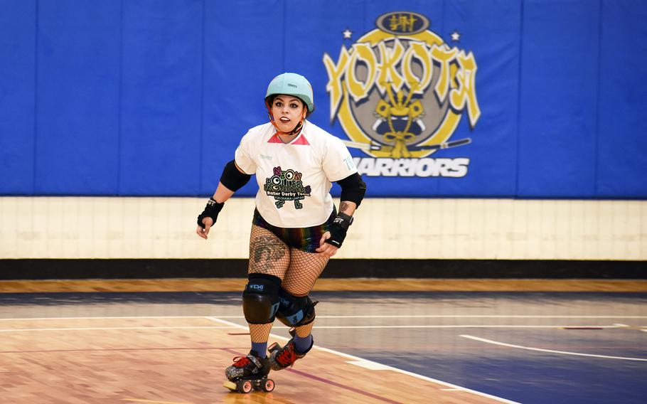 Brittney Oquendo of the Yokosuka Sushi Rollers competes in a "Rocky Horror"-themed roller derby match at the Samurai Fitness Center on Yokota Air Base, Japan, Sept. 24, 2023. 