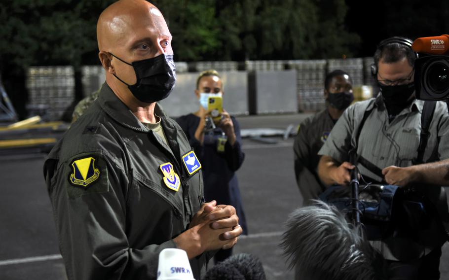 Brig. Gen. Josh Olson, 86th Airlift Wing commander at Ramstein Air Base, Germany, speaks to reporters on Friday, Aug. 20, 2021, about how Ramstein is prepared to temporarily support thousands of evacuees from Afghanistan. Hundreds arrived Friday night.