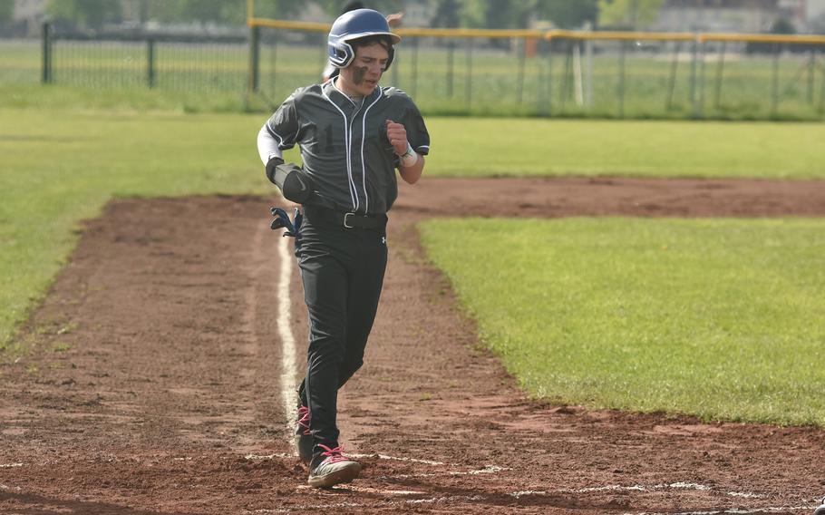 Wiesbaden junior Jonah Harvey scores the first run of a game against Spangdahlem on April 20, 2024, in Wiesbaden, Germany.  The Warriors won the game 12-9.