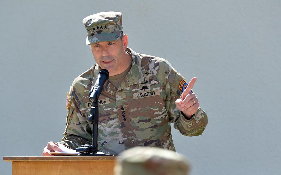 Gen. Christopher Donahue speaks at a podium.