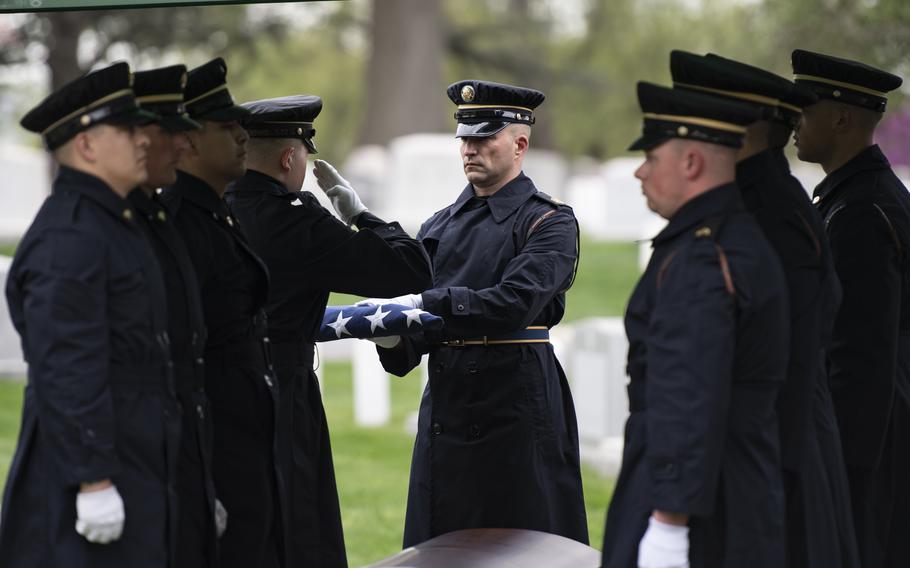 Soldiers from the 3d U.S. Infantry Regiment (The Old Guard) and the U.S. Army Band, “Pershing’s Own,” conduct military funeral honors with funeral escort for U.S. Army Air Forces Sgt. Irving Newman in Section 4 of Arlington National Cemetery, Arlington, Va., April 11, 2024. 