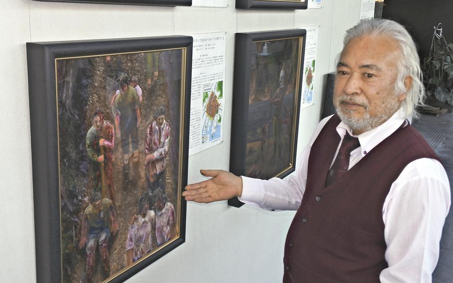 Kazunuki Hashimoto shows artwork completed this academic year at Motomachi High School in Hiroshima. 