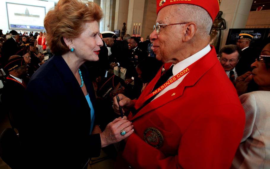 Senator Debbie Stabenow of Michigan with Montford Point Marine Calvin Shepard.