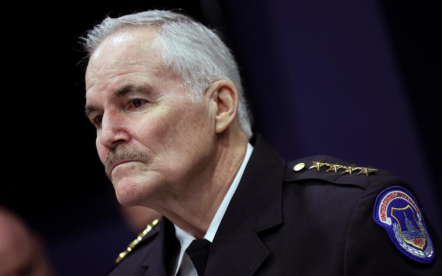 J. Thomas Manger in uniform at a hearing.
