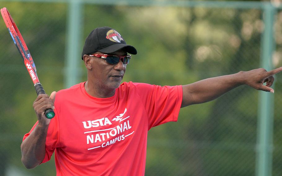 E.J. King coach McKinzy Best makes his point during practice.
