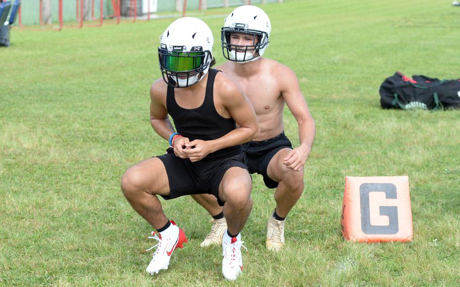 Kubasaki players go through drills in practice.