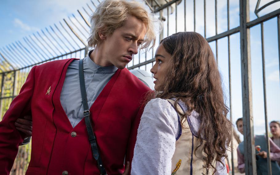 Tom Blyth as Coriolanus Snow and Rachel Zegler as Lucy Gray Baird in “The Hunger Games: The Ballad of Songbirds and Snakes.” 