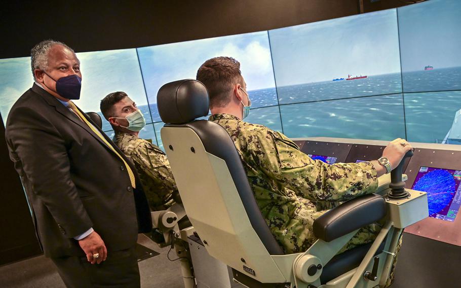 Secretary of the Navy Carlos Del Toro speaks with sailors while visiting the Surface Warfare Officers School in Newport, R.I., Sept. 13, 2021.