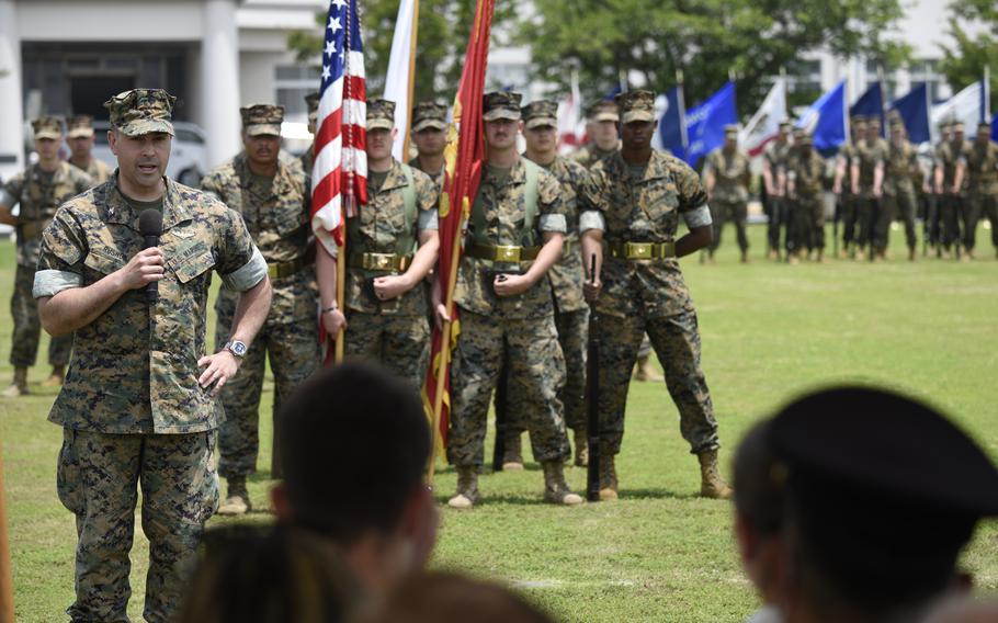 Col. Richard Rusnok, the new commander of Marine Corps Air Station Iwakuni, Japan, speaks at the change of command ceremony on June 16, 2022.