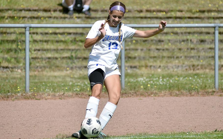 Sigonella striker Madison Hoy launches a free kick during the second day of round-robin action against Brussels at the 2025 Division III DODEA European championships on May 20, 2025, at Rothenborn Stadion in Landstuhl, Germany. The Jaguars clinched a spot in the Division III title match Wednesday with a 2-1 win over Spangdahlem, and they will face defending champion AFNORTH on Thursday at Ramstein High School.