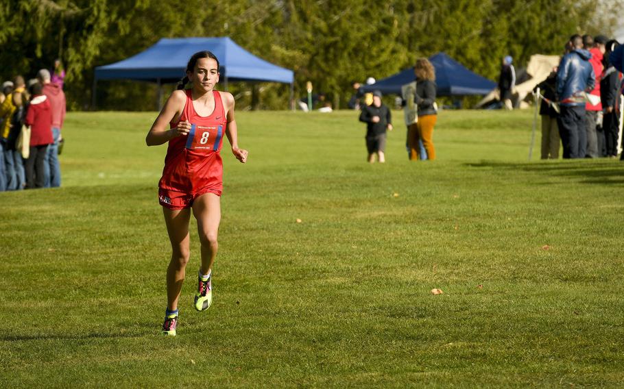 Lakenheath sophomore Abra Mills runs out to a lead during the girls DODEA-Europe cross country championship race Oct. 21, 2023, in Baumholder, Germany.