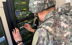 A South Korean soldier inspects loudspeaker equipment at an unspecified location near the Demilitarized Zone in South Korea, June 9, 2024. 